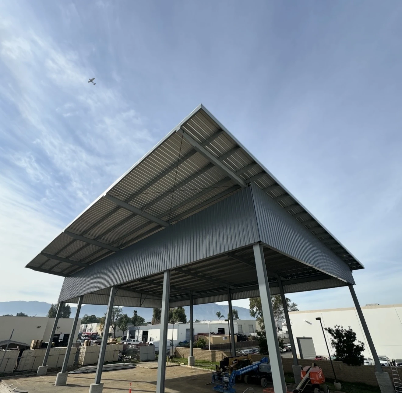 Completed engineered steel canopy building with metal roof